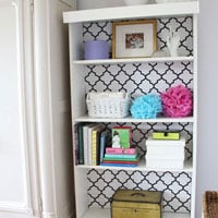 Fabric storage using Ikea Billy shelves and comic book boards to wrap the  fabric