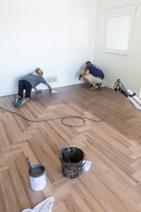 Bona Hardwood floor refinishing being done on wood floor