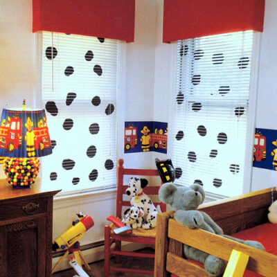DIY Red corduroy cardboard window cornice with Dalmatian blinds.