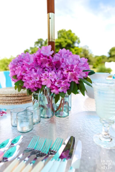 DIY Mason jar vase to go around an umbrella hole and pole on a patio table