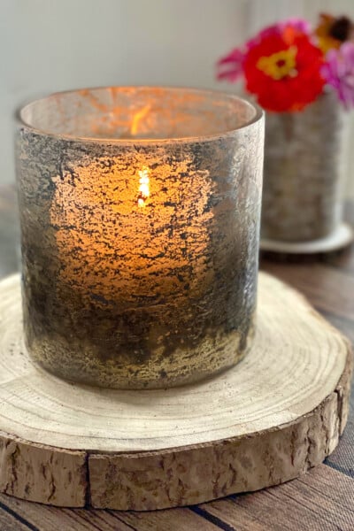 Candle in rustic glass candle holder