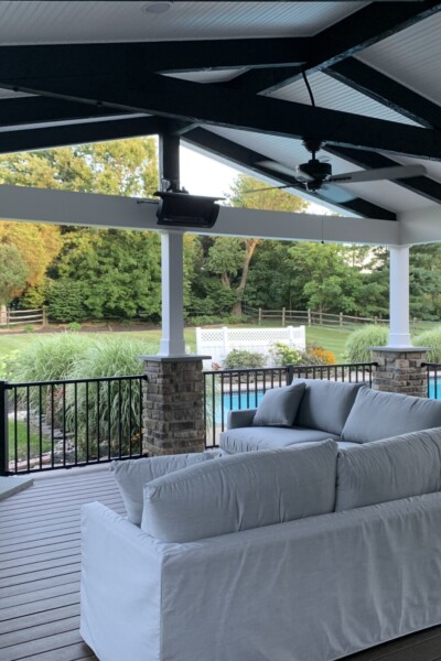 Outdoor fireplace and covered porch