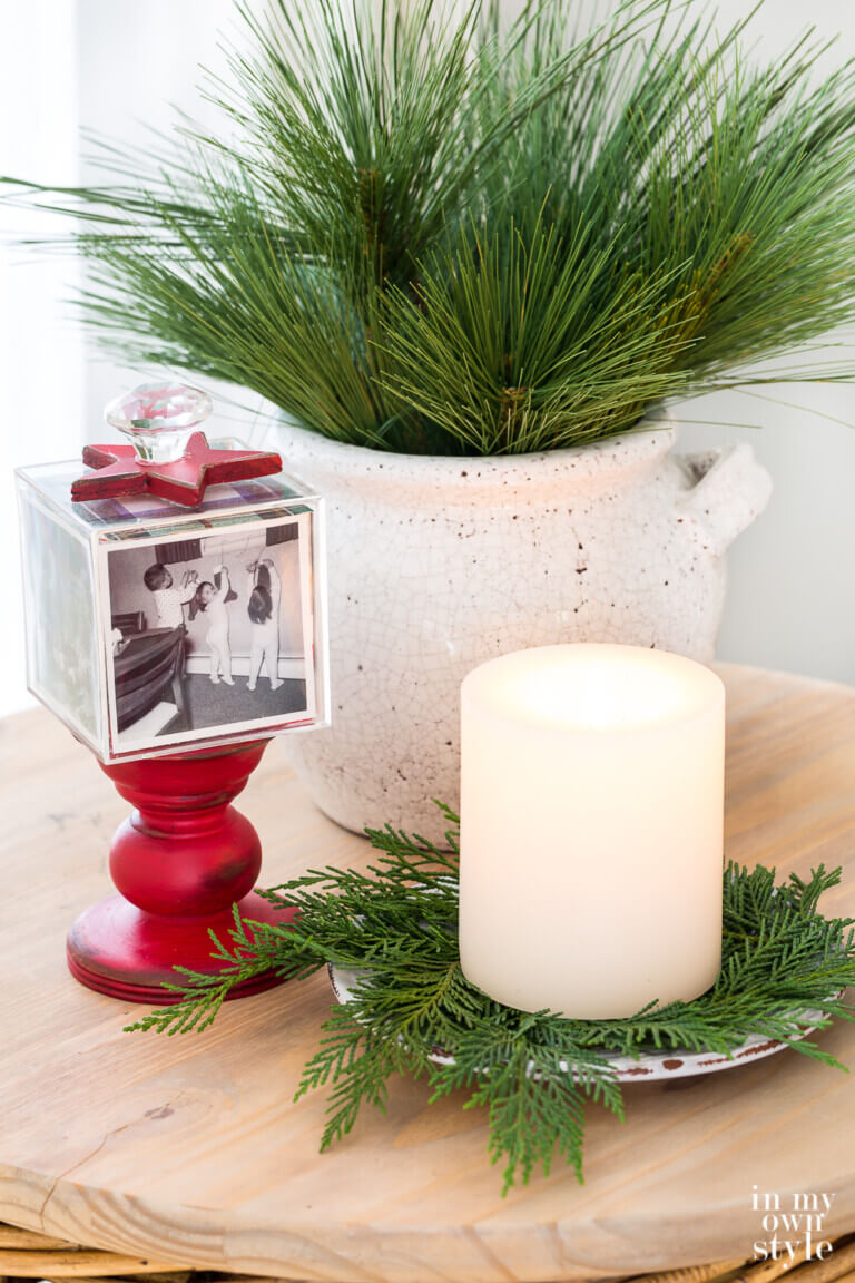 red and green Christmas decor on a wood table