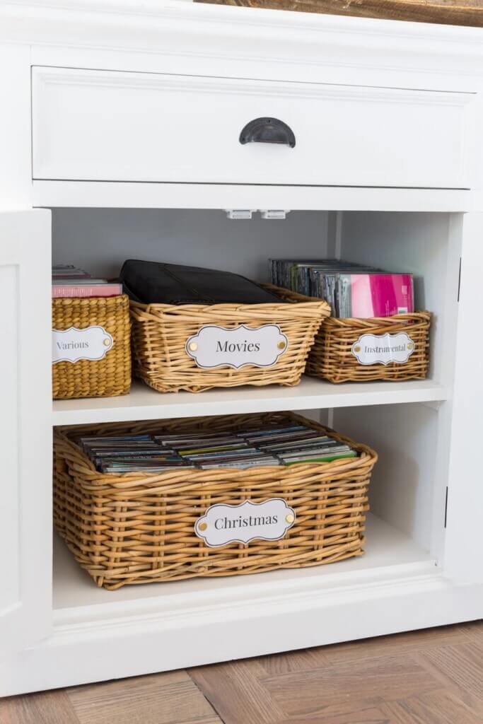 thrift store baskets with DIY free printable labels on them.
