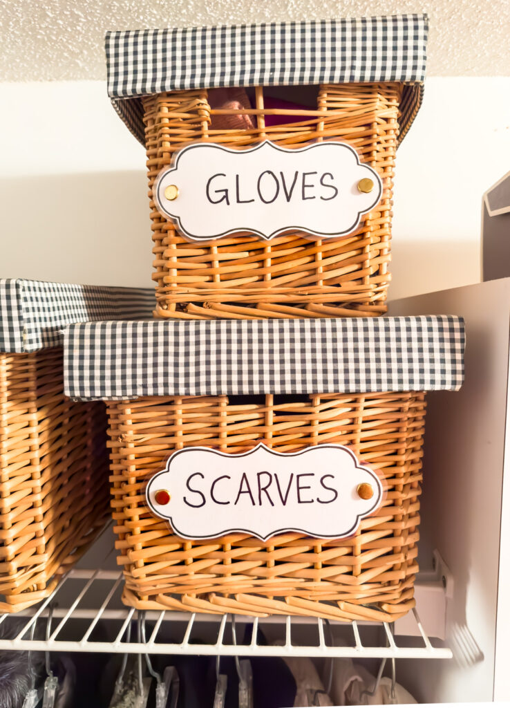 clothes closet organizing ideas using stackable baskets with DIY labels.