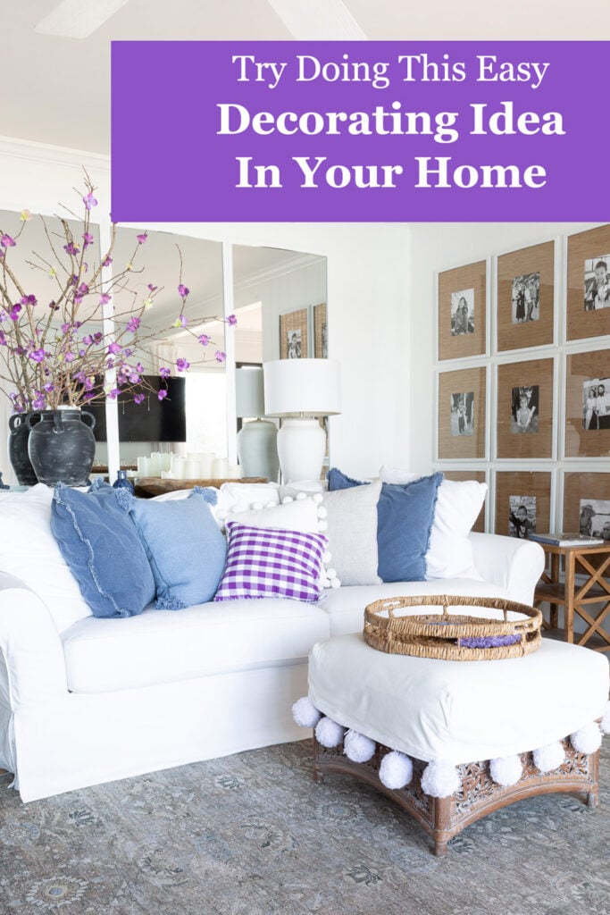 white furniture in a living room with blue and purple accents.