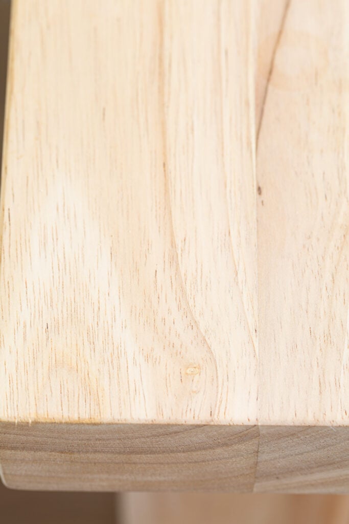 close up of wood grain top on kitchen island before getting finished with Polycrylic Max.