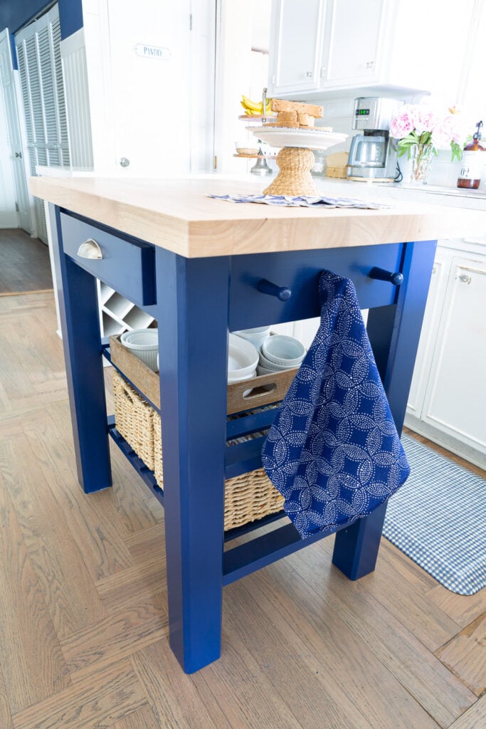 After photo of just painted kitchen island in the color Dress Blues from Sherwin Williams.