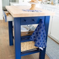 A kitchen island painted with Sherwin Williams Dress Blues 9176