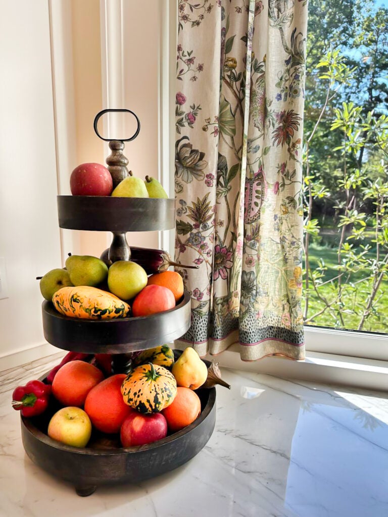 stacked fruit on kitchen counter