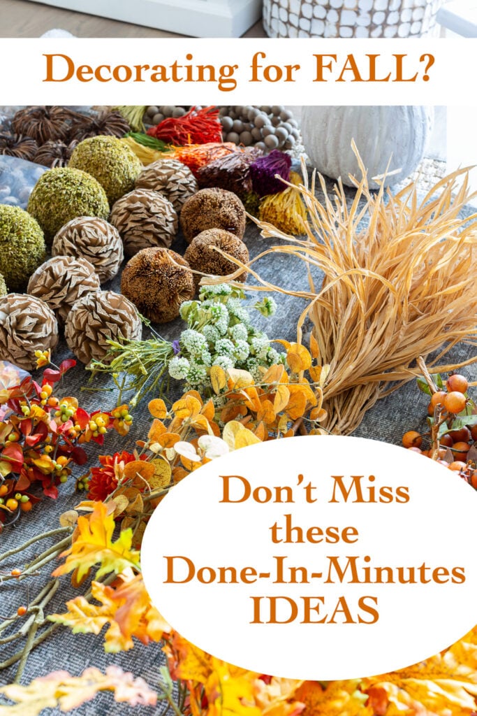 fall decor spread out on a floor to use to decorate a home for the fall season using fast and easy autumn decor ideas.