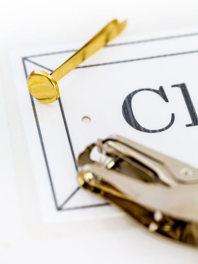 How to attach a DIY label with brass fasteners