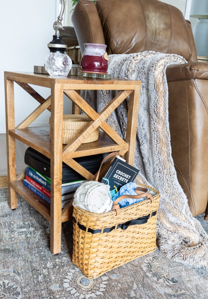 my analog basket on the floor in front of a side table in my living room.