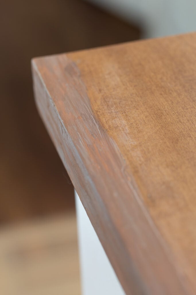 close up of blending in paint to a wood addition to match Fomica kitchen counter