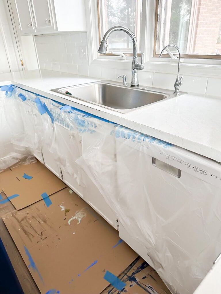 getting kitchen counters prepped for stripping paint off of them