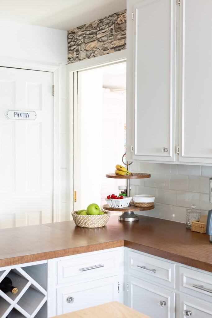 kitchen corner area with brown Formica counters