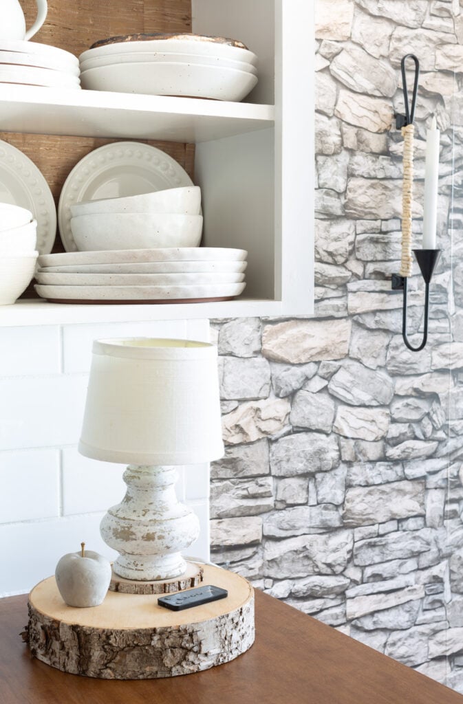 kitchen counter lamp on a tree trunk slice