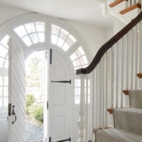 Main Line Pa home with arched entry door.