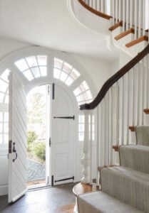 Main Line Pa home with arched entry door.