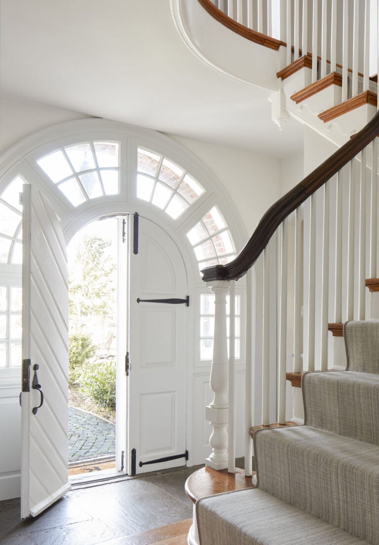 Main Line Pa home with arched entry door.