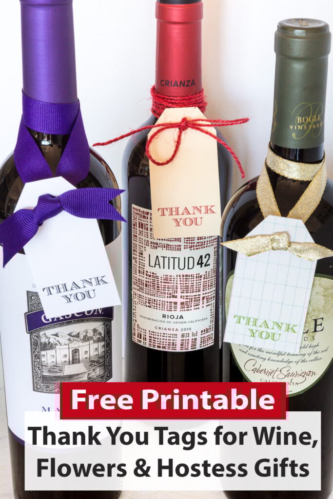 Free printable thank you tags tied onto 3 wine bottles to give as gifts or hostess gifts.