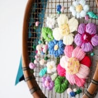 colorful, embroidered tennis racket craft