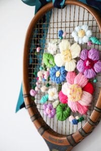 colorful, embroidered tennis racket craft