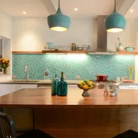 Beautiful kitchen with blue lights and backsplash