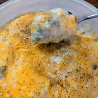 Shepherd's pie with beef, mashed potatoes, peas, corn, and cheese
