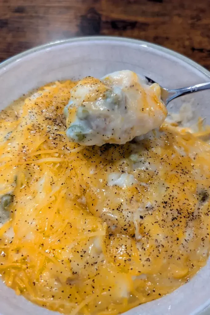 Shepherd's pie with beef, mashed potatoes, peas, corn, and cheese