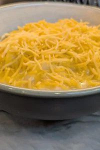 Shepherd's pie with cheddar cheese on top