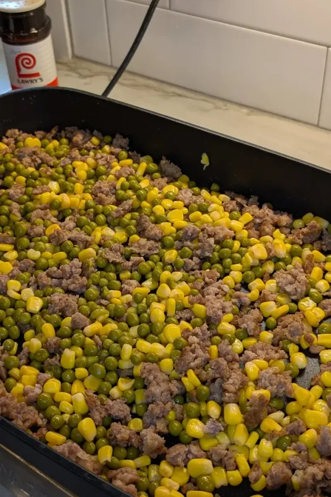 Shepherd's pie with corn and peas
