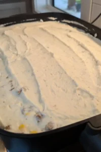 Shepherd's pie with mashed potatoes spread on top
