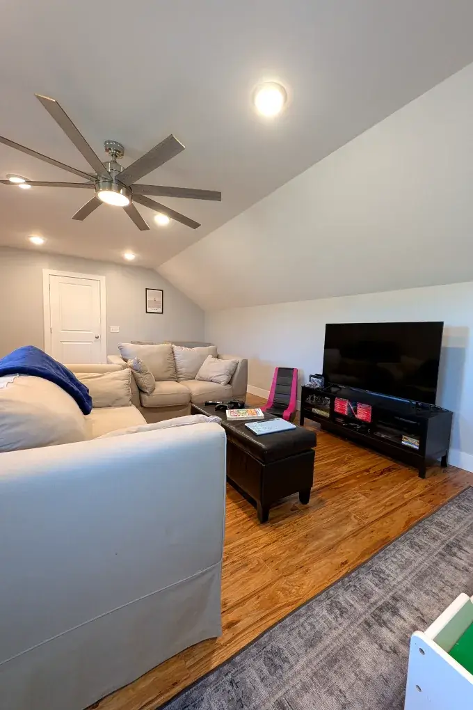 Room with couches and a television