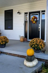 Welcoming front door with fall decor